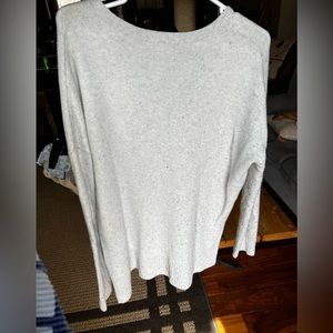 Oversized light grey sweater.